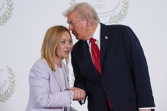 President Donald Trump greets Italy&#039;s Prime Minister Giorgia Meloni during summit to support ending the more than two-year Israel-Hamas war in Gaza after a breakthrough ceasefire deal, Monday, Oc ...