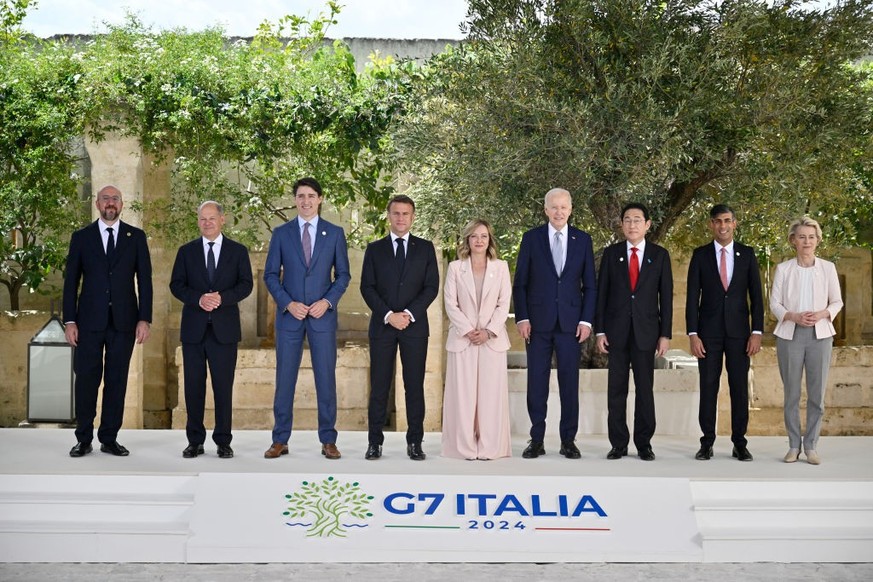FASANO, ITALY - JUNE 13: Italy's Prime Minister Giorgi Meloni greets President of France Emmanuel Macron during the first day of the G7 meeting at Borgo Egnazia resort, on June 13, 2024 in Fasano ...