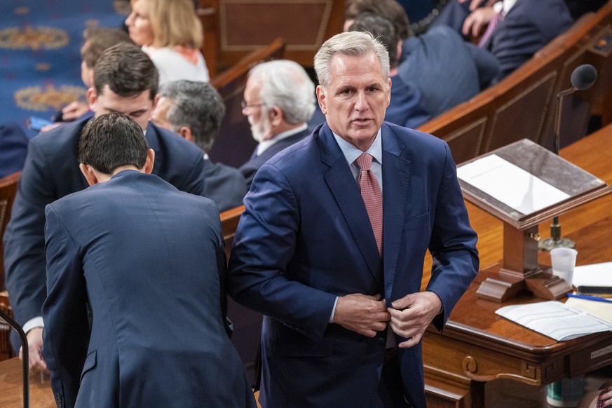 epa10387646 House Republican Leader Kevin McCarthy during first ballot vote tabulation for Speaker of the House during the opening session of the 118th Congress on the House floor in the US Capitol in ...