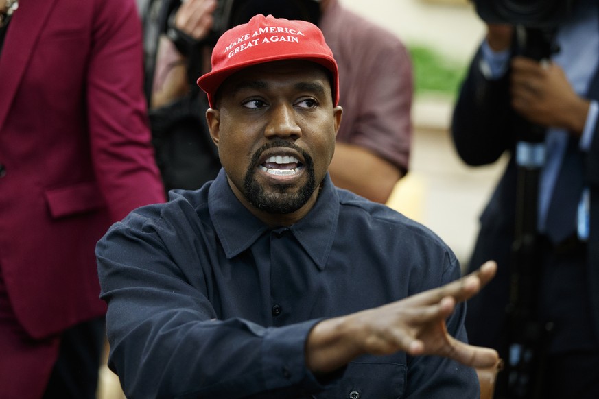 FILE - Rapper Kanye West speaks during a meeting in the Oval Office of the White House with President Donald Trump, Thursday, Oct. 11, 2018, in Washington. Kanye West was escorted out of the Californi ...
