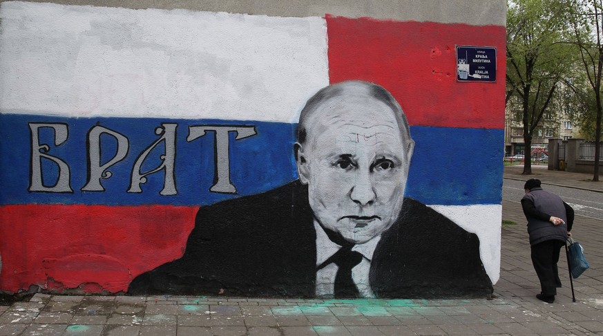 Serbia Elections 8156815 03.04.2022 A mural with the image of Russian President Vladimir Putin and the sign Brother is seen on a wall of a building during the presidential and parliamentary elections  ...