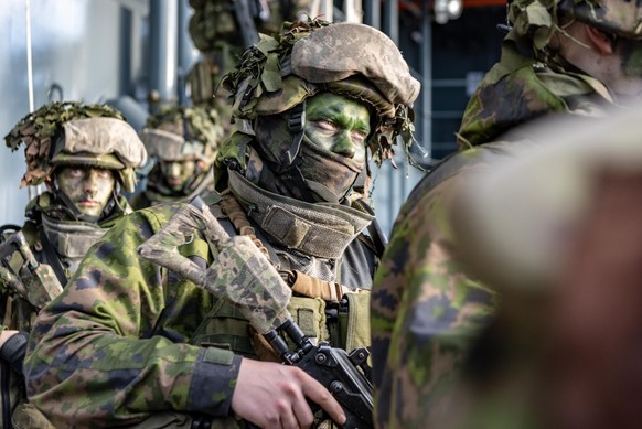 Des soldats finlandais lors d'un exercice militaire en 2018.