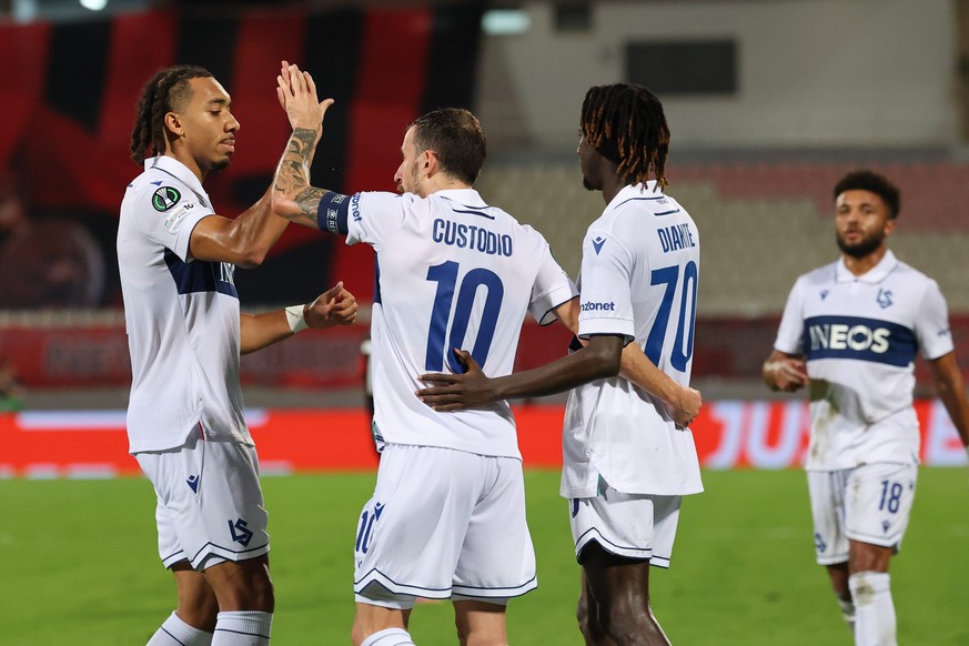 epa12476843 Gaoussou Diakite (2-R) of Lausanne-Sport celebrates with his teamamtes after scoring the 0-1 goal during the UEFA Conference League league phase soccer match between Hamrun Spartans FC and ...