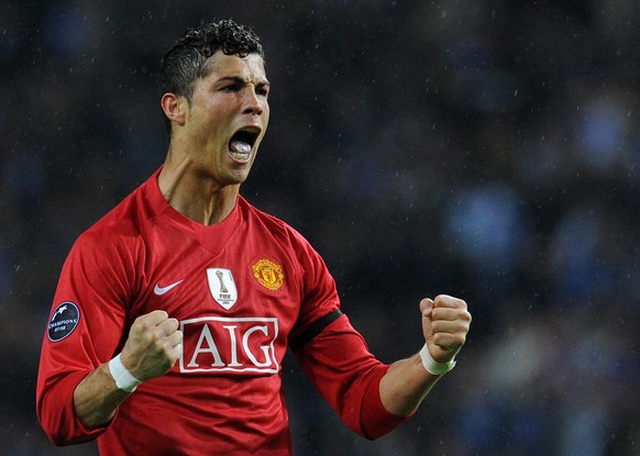 FILE- In this Wednesday, April 15, 2009 file photo Manchester United&#039;s Cristiano Ronaldo celebrates after their victory over FC Porto in a Champions League quarterfinal second leg soccer match at ...