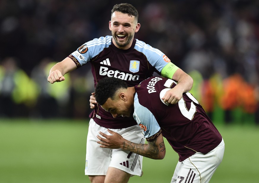 epa12940049 Aston Villa's John McGinn (L) and Morgan Rogers (R) celebrate after winning the UEFA Europa League semi-finals 2nd leg match Aston Villa against Nottingham Forest, in Birmingham, Brit ...