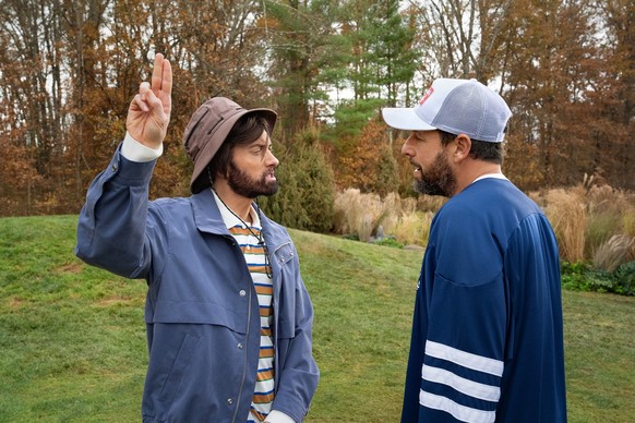 HAPPY GILMORE 2. (L to R) Eminem as Donald Jr. and Adam Sandler as Happy Gilmore in Happy Gilmore2. Cr. Scott Yamano/Netflix © 2025.