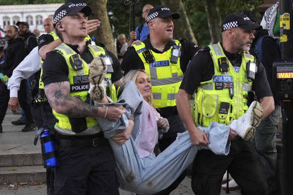Police officers carry a protester during a protest to support Palestine Action in London, Saturday, Sept. 6, 2025.(AP Photo/Joanna Chan)
Britain Israel Palestinians Protest