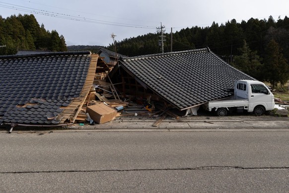 WAJIMA, JAPAN - JANUARY 02: Houses damaged by the earthquake are seen on January 02, 2024 in Wajima, Japan. A series of major earthquakes have reportedly killed at least 48 people, injured dozens more ...