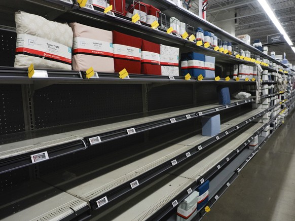 epa12066314 Partially empty shelves of bedsheet fittings made in China on clearance at a Walmart retail store in San Leandro, California, USA, 30 April 2025. Executives from Walmart, Target and Home D ...