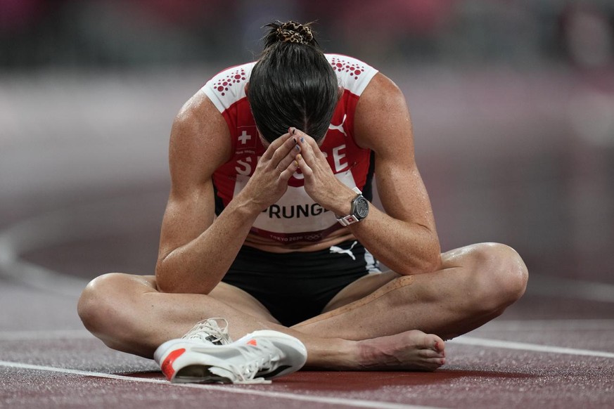 Lea Sprunger, of Switzerland, reacts after her semifinal of the women&#039;s 400-meter hurdles at the 2020 Summer Olympics, Monday, Aug. 2, 2021, in Tokyo. (AP Photo/Petr David Josek)