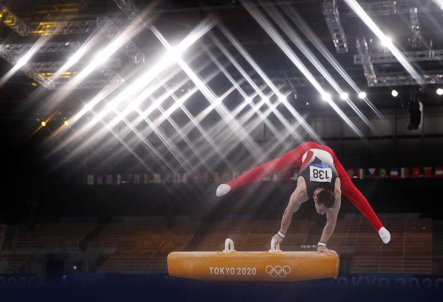 epa09362182 Andreas Toba of Germany performs during the men&#039;s Pommel Horse Qualification in Artistic Gymnastics events of the Tokyo 2020 Olympic Games&amp;#x200b; at the Ariake Gymnastics Centre  ...