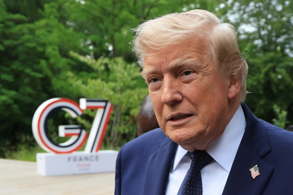 U.S. President Donald Trump arrives to attend a musical interlude before a gala dinner as part of the G7 summit, in Evian-les-Bains, France, Tuesday June 16, 2026. (Ludovic MARIN/Pool Photo via AP)
Do ...