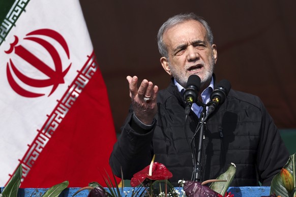 FILE - In this photo released by the Iranian Presidency Office, President Masoud Pezeshkian speaks during a rally commemorating anniversary of 1979 Islamic Revolution that toppled the late pro-U.S. Sh ...