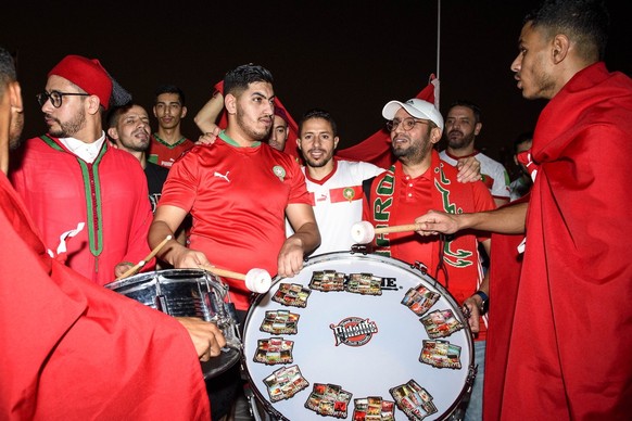 epa10255103 Moroccan soccer fans play drums during a ceremony marking 30 days to go until the opening ceremony of the FIFA World Cup Qatar 2022 in Doha, Qatar, 20 October 2022. The FIFA World Cup 2022 ...