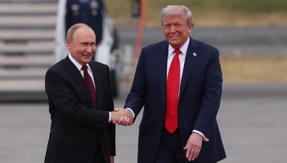 ANCHORAGE, ALASKA - AUGUST 15: (RUSSIA OUT) U.S. President Donald Trump and Russian President Vladimir Putin meet for their summit on the war in Ukraine, at U.S. Air Base on August 15, 2025, in Anchor ...