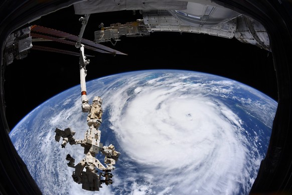 epa09436517 A handout image taken aboard the International Space Station (ISS) and made available by the European Space Agency (ESA) shows Hurricane Ida churning in the Gulf of Mexico ahead of its lan ...