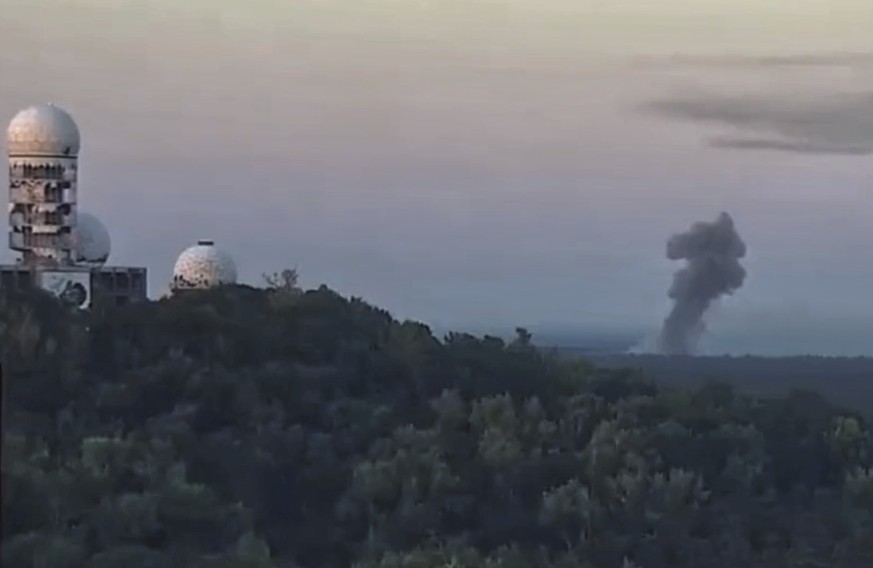 This video still image shows the rising smoke after an explosion at a blasting site inside the Grunewald forest in Berlin, Germany, Thursday, Aug. 4, 2022. A large fire has broke out in one of Berlin& ...