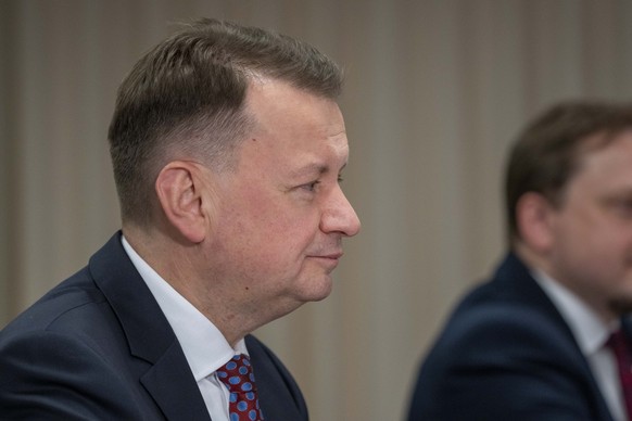 Poland&#039;s Deputy Prime Minister and Minister of National Defense Mariusz Blaszczak, left, listens during a meeting with Secretary of Defense Lloyd Austin at the Pentagon, Friday, May 5, 2023, in W ...