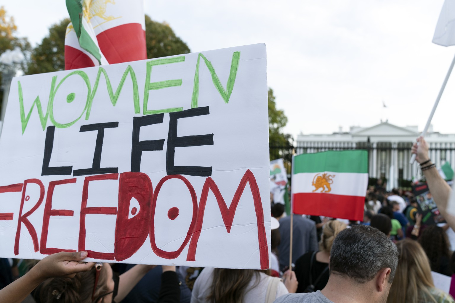 Demonstrators rally outside the White House to protest against the Iranian regime, in Washington, Saturday, Oct. 22, 2022, following the death of Mahsa Amini in the custody of the Islamic republic&#03 ...