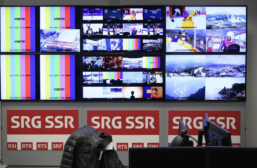 Screens of Swiss broadcaster SRG SSR are pictured during a media visit of the International Broadcasting Center (IBC) the day of the opening of the XXIII Winter Olympics 2018 in Pyeongchang, South Kor ...