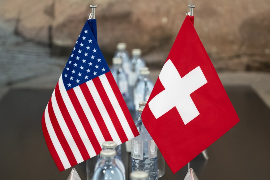 epa12569657 US and Swiss flags pictured prior to a bilateral meeting between Swiss Federal Councillor and Foreign Minister Ignazio Cassis (not pictured) and High Representative of the European Union f ...
