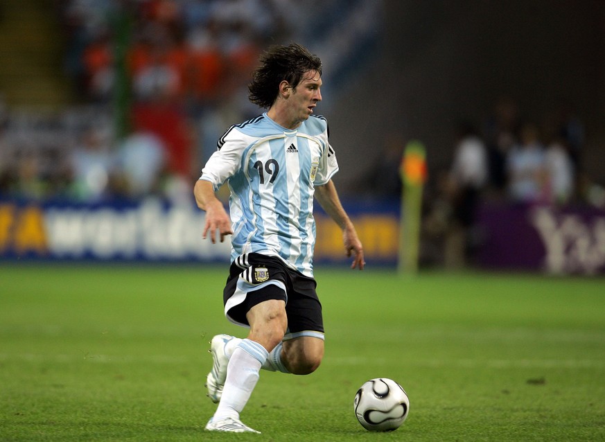 FILE - Argentina's Lionel Messi attacks against the Netherlands during the World Cup Group C soccer match between the Netherlands and Argentina in the World Cup stadium in Frankfurt, Germany, Wed ...