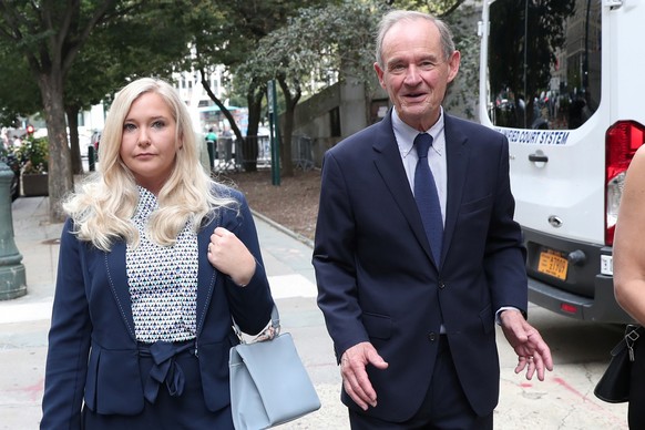 Lawyer David Boies arrives with his client Virginia Giuffre for hearing in the criminal case against Jeffrey Epstein, who died this month in what a New York City medical examiner ruled a suicide, at F ...