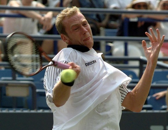 Marc Rossett of Switzerland returns the ball to Alex Corretja of Spain during their first round match at the U.S. Open tennnis tournament Tuesday, Aug. 26, 1997 in New York. Alex Corretja defeated Ros ...