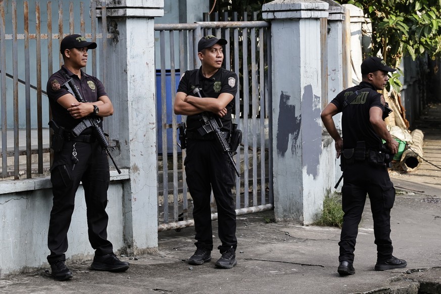 epa13254112 Philippine police keep watch from a distance at an anti-corruption rally in Manila, Philippines 21 September 2026. Human rights advocates held a rally attempting to come near the President ...