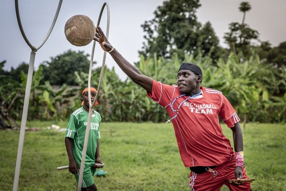 Trave Katumba, 18, who plays as a chaser, jumps on the air to score during a training session of Quidditch, also known as Quadball, a sport inspired by the fictional game in the Harry Potter books, in ...