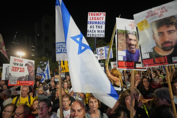 Relatives and supporters of Israeli hostages held in the Gaza Strip attend a rally demanding their release from Hamas captivity and calling for an end to the war, in Tel Aviv, Israel, Saturday, Sept.  ...