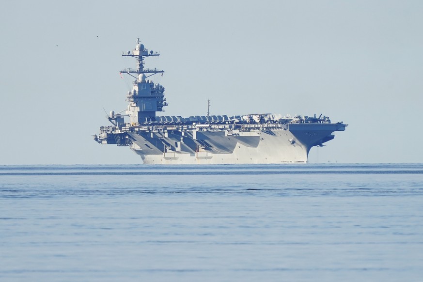 epa10649324 American aircraft carrier USS Gerald R. Ford on its way into the Oslo Fjord in Jeloya, Norway, 24 May 2023. The world&#039;s largest warship will be in port of Oslo for four days. EPA/Terj ...