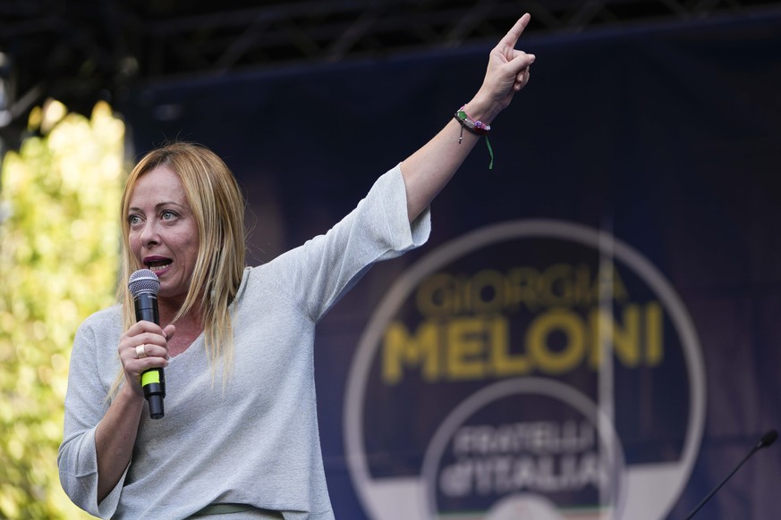 Right-wing party Brothers of Italy&#039;s leader Giorgia Meloni addresses a rally as she starts her political campaign ahead of Sept. 25 general elections, in Ancona, Italy, Tuesday, Aug. 23, 2022. (A ...