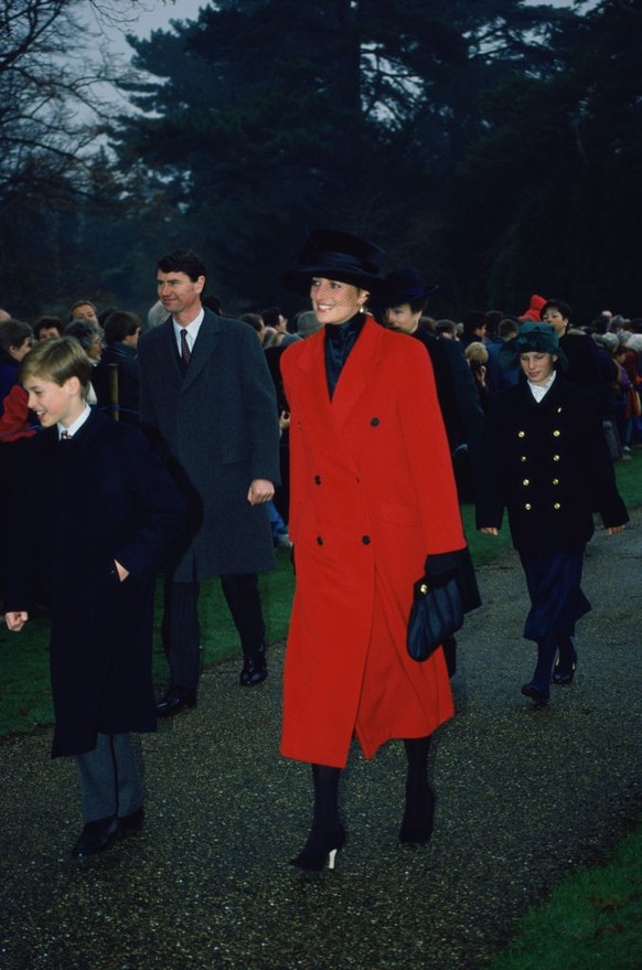 Princess Diana (1961 - 1997) and her son Prince William on their way to a Christmas Day service at Sandringham Church, 25th December 1993. (Photo by Princess Diana Archive/Getty Images)