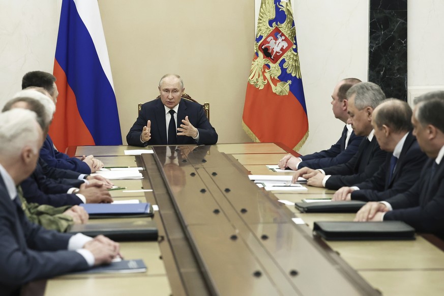 Russian President Vladimir Putin chairs a meeting with the heads of Russian law enforcement agencies at the Kremlin in Moscow, Russia, Monday, June 26, 2023. (Valery Sharifulin, Sputnik, Kremlin Pool  ...
