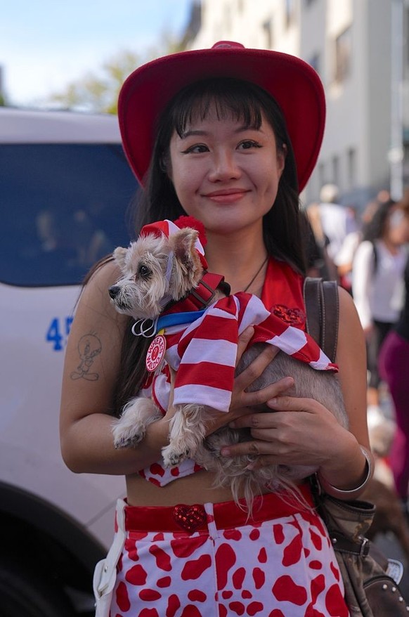 NEW YORK, UNITED STATES - OCTOBER 19: Dog owners in New York City are participating in the Tompkins Square Halloween Dog Parade, dressing their furry friends in colorful costumes on Sunday, October 19 ...