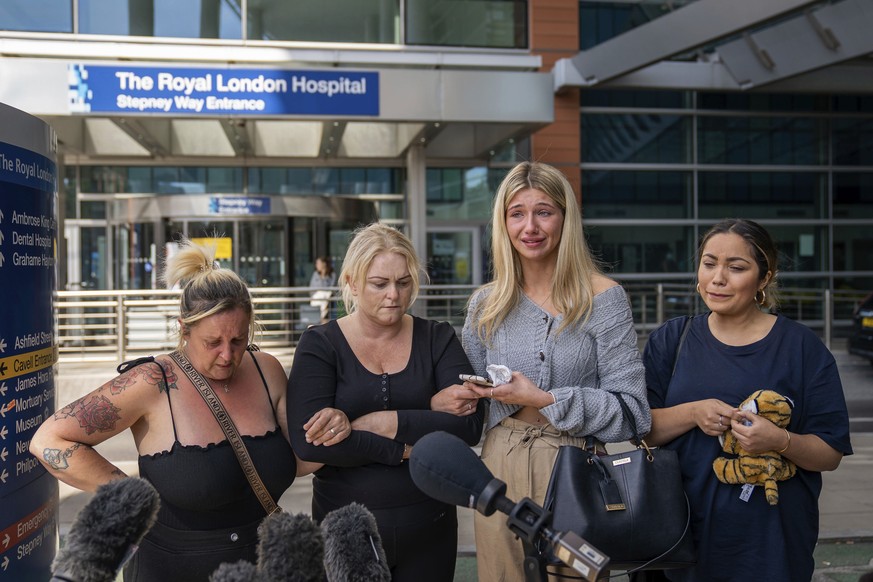 Hollie Dance, second left, surrounded by family and friends, outside the Royal London hospital addresses the media following the death of her 12 year old son Archie Battersbee, in Whitechapel, east Lo ...