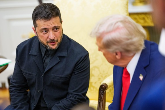 epa12308751 United States President Donald J Trump (R) meets Ukrainian President Volodymyr Zelensky in the Oval Office of the White House in Washington, DC, USA, 18 August 2025. European Leaders are a ...