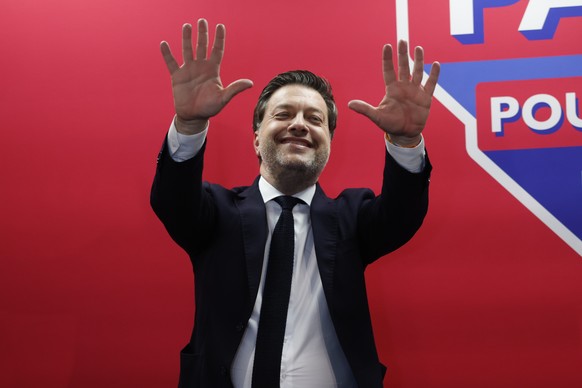 epaselect epa12842774 Marseille's mayor Benoit Payan, candidate supported by the left-wing parties, celebrates his win following the announcement of the preliminary results from the second round  ...