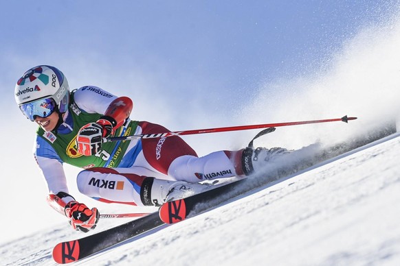 Michelle Gisin of Switzerland in action during the first run of the Women&#039;s Giant Slalom race of the FIS Alpine Ski World Cup season opener on the Rettenbach glacier, in Soelden, Austria, on Satu ...