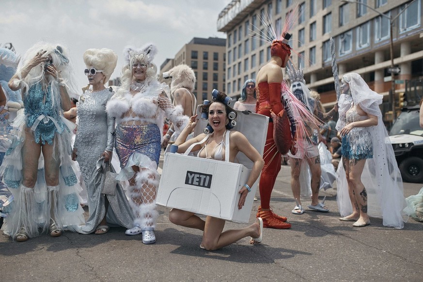 Revelers march during the Mermaid Parade in the Coney Island section of the Brooklyn borough of New York, Saturday, June 17, 2023. (AP Photo/Andres Kudacki)