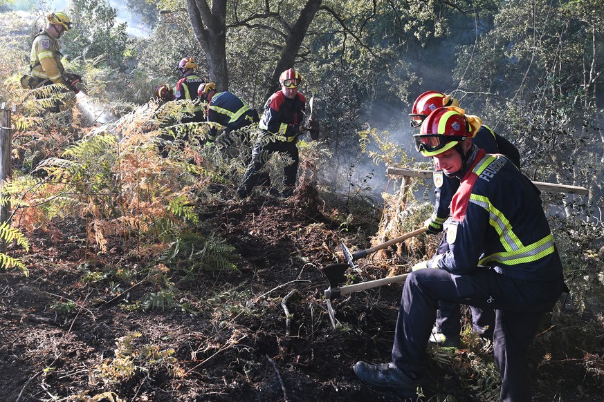 epa10117844 German firefighters fighting a forest fire as part of the European Civil Protection cooperation in Hostens, in the Gironde region of southwestern France, 12 August 2022. Southwestern Franc ...