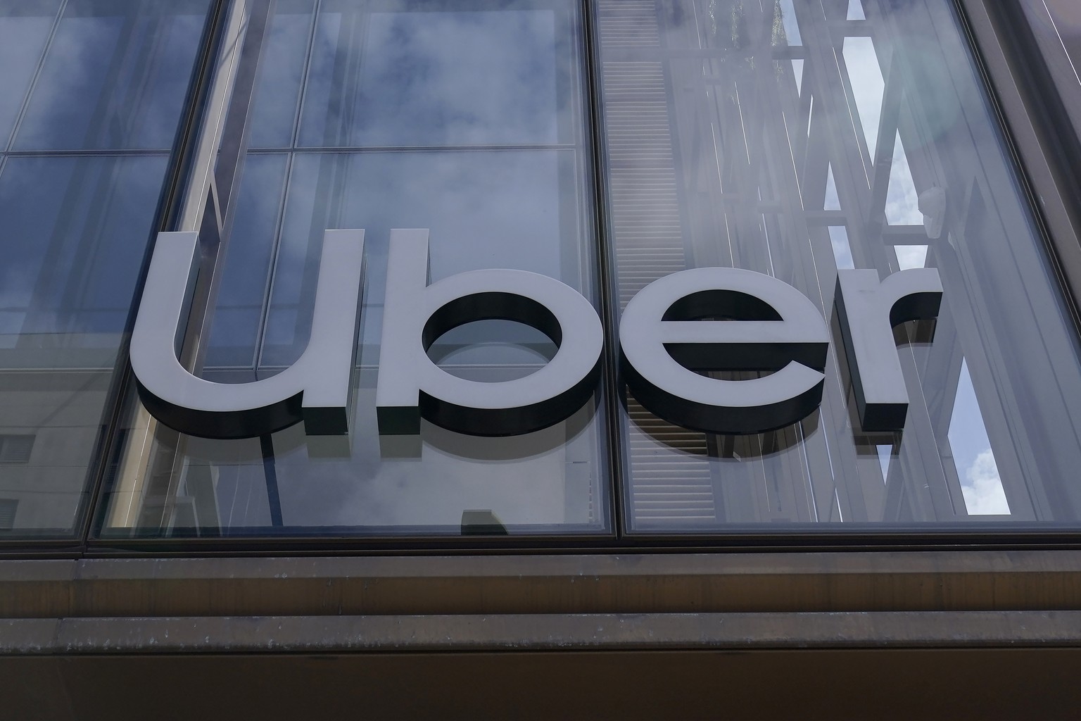 FILE - An Uber sign is displayed at the company&#039;s headquarters in San Francisco, Monday, Sept. 12, 2022. Joseph Sullivan, the former chief security officer for Uber, was convicted Wednesday, Oct. ...