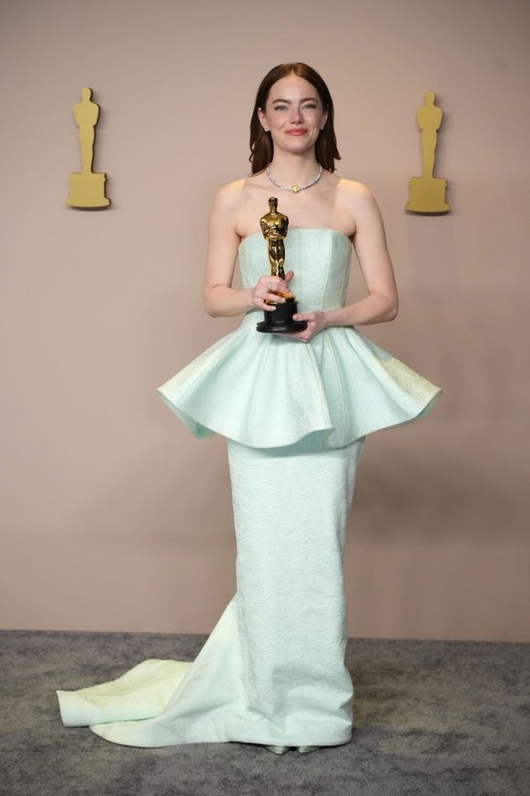 HOLLYWOOD, CALIFORNIA - MARCH 10: Emma Stone poses in the press room during the 96th Annual Academy Awards at Ovation Hollywood on March 10, 2024 in Hollywood, California. (Photo by Jeff Kravitz/FilmM ...