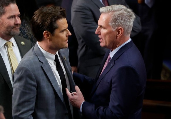 WASHINGTON, DC - JANUARY 06: U.S. House Republican Leader Kevin McCarthy (R-CA) (R) talks to Rep.-elect Matt Gaetz (R-FL) in the House Chamber during the fourth day of elections for Speaker of the Hou ...