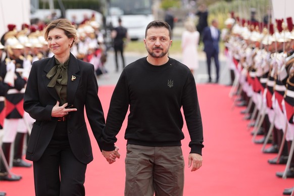 Ukrainian President Volodymyr Zelenskyy and his wife Olena Zelenska, arrive at the international ceremony at Omaha Beach, Thursday, June 6, 2024 in Normandy. Normandy is hosting various events to offi ...