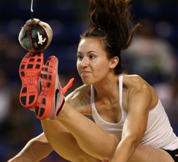 July 22, 2011 - Fairbanks, AK, U.S. - John Wagner/News-Miner.Erica Meckel competes in the women s two foot high kick event Friday evening, July 22, 2011, during the World Eskimo Indian Olympics at the ...