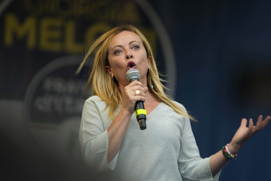 Right-wing party Brothers of Italy&#039;s leader Giorgia Meloni addresses a rally as she starts her political campaign ahead of Sept. 25 general elections, in Ancona, Italy, Tuesday, Aug. 23, 2022. (A ...