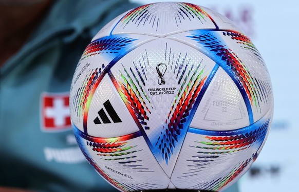 epa10322905 The official adidas Al Rihla FIFA World Cup 2022 match ball on display during a press conference at Qatar National Convention Center (QNCC) in Doha, Qatar, 23 November 2022. Switzerland wi ...