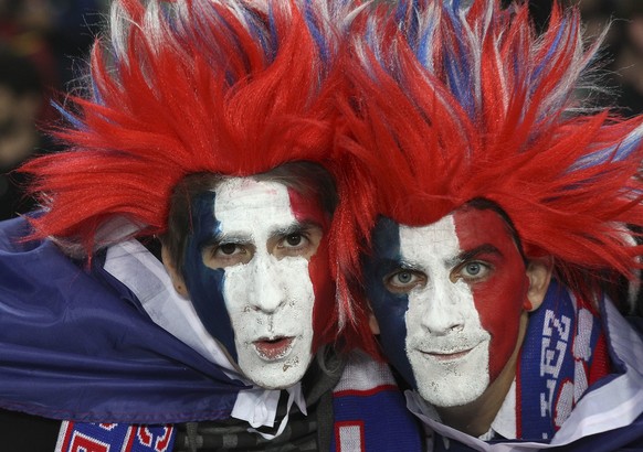 French fans pose for the camera ahead of their team&#039;s Rugby World Cup final against the New Zealand All Blacks at Eden Park in Auckland, New Zealand, Sunday, Oct. 23, 2011.(AP Photo/Rob Griffith)